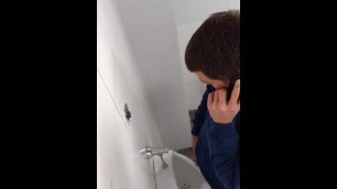 Young in the Urinal