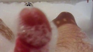 masturbating in a foamy bath