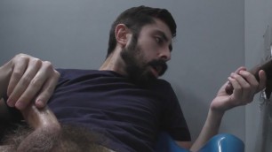 Bearded White Man Sucking and Fucking a Black Cock at a Gloryholegay