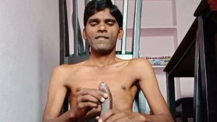 Rajesh sitting on the floor, masturbating dick and cumming on the feet