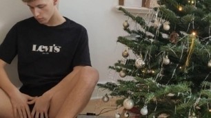 Little twink Jakob jerks his dick under the Christmas Tree