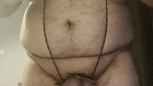 Untying and re-tying my cock and balls with shoe laces and rubber bands with nipple clamps and buttplug