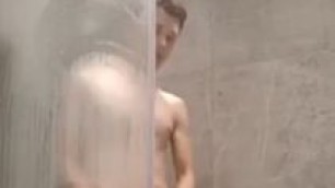 Sexy twink plays & cums in shower for fans